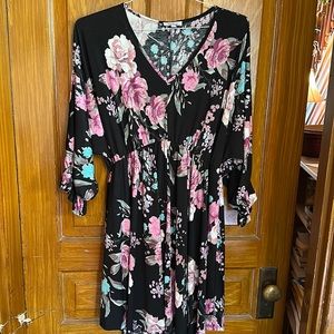 Women’s dress.. size xl… ruffed sleeve…